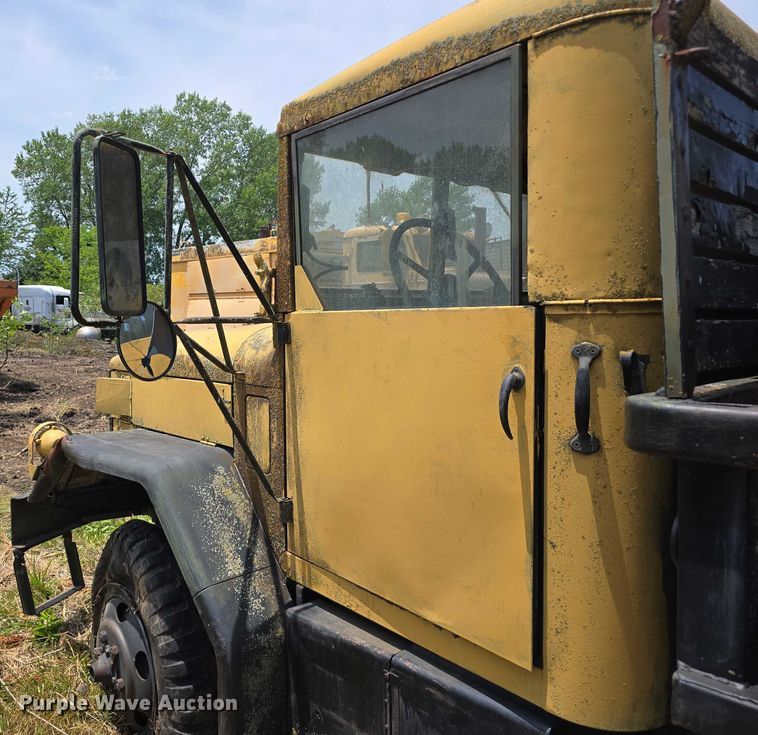 image for item DT6947 1972 AM General dump flatbed truck