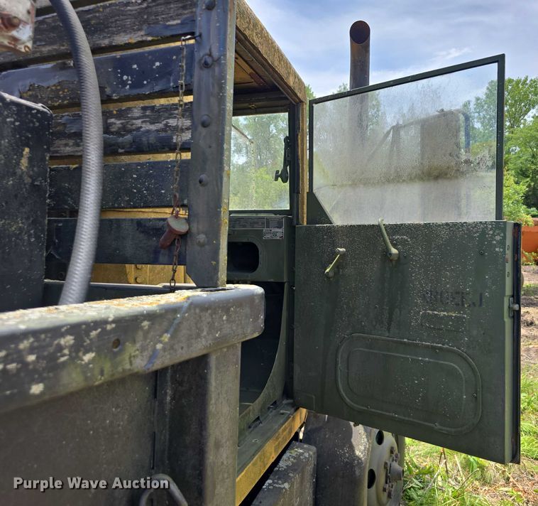 image for item DT6947 1972 AM General dump flatbed truck