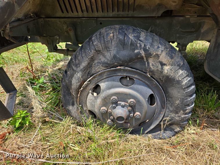 image for item DT6947 1972 AM General dump flatbed truck