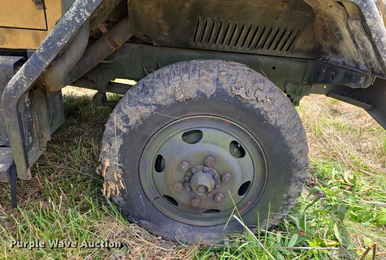 image for item DT6947 1972 AM General dump flatbed truck