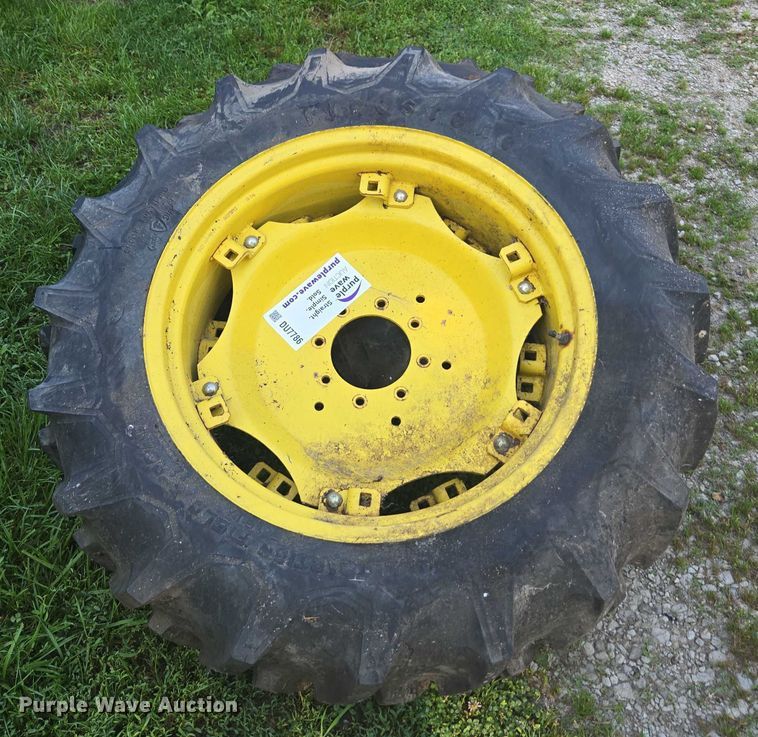 image for item DU7786 (2) 12.4-28 firestone tires and wheels