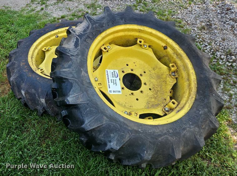 image for item DU7786 (2) 12.4-28 firestone tires and wheels