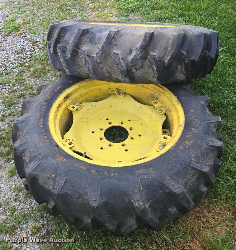 image for item DU7786 (2) 12.4-28 firestone tires and wheels