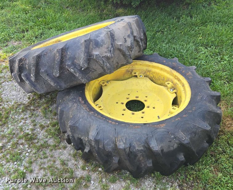 image for item DU7786 (2) 12.4-28 firestone tires and wheels