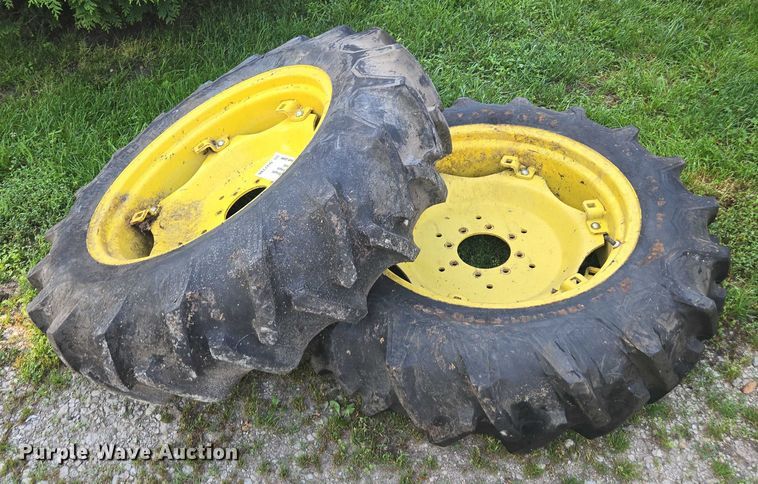 image for item DU7786 (2) 12.4-28 firestone tires and wheels