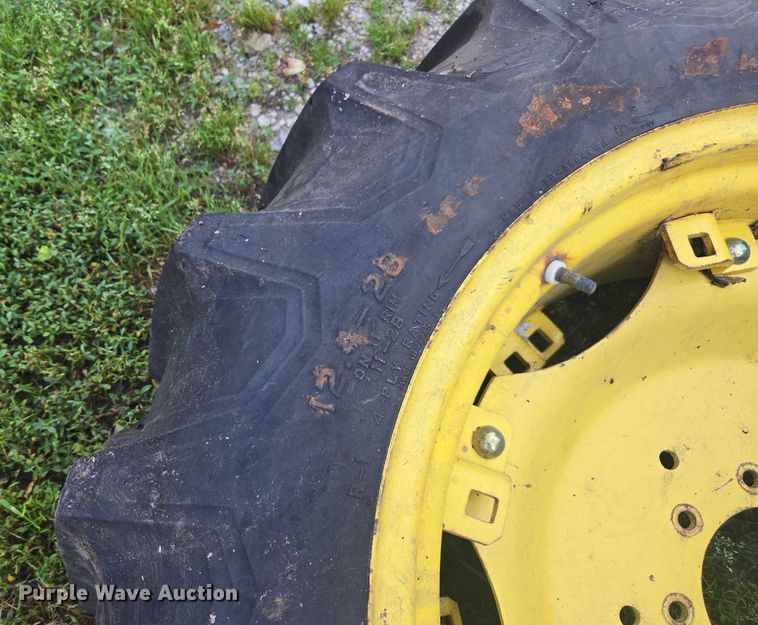 image for item DU7786 (2) 12.4-28 firestone tires and wheels