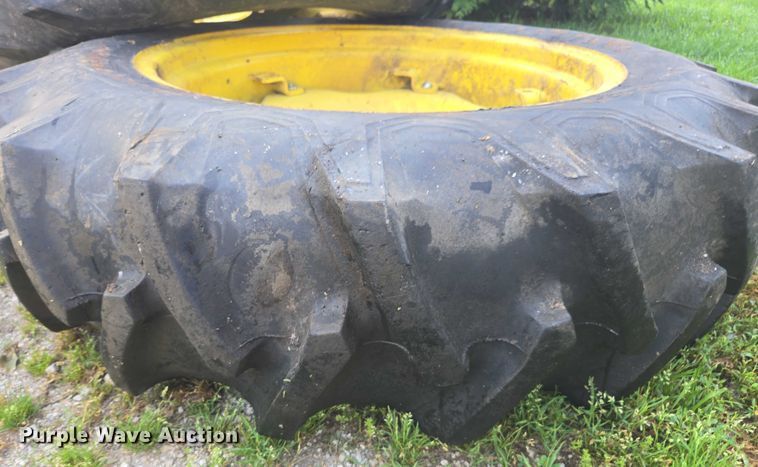 image for item DU7786 (2) 12.4-28 firestone tires and wheels