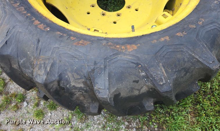 image for item DU7786 (2) 12.4-28 firestone tires and wheels