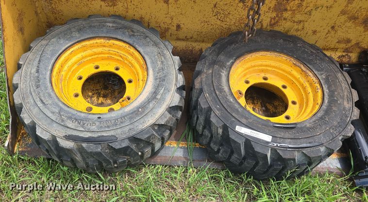 image for item EK5301 (2) BKT 12-16.5 skid steer tires and wheels
