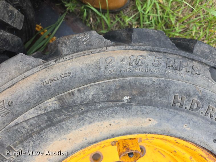 image for item EK5301 (2) BKT 12-16.5 skid steer tires and wheels