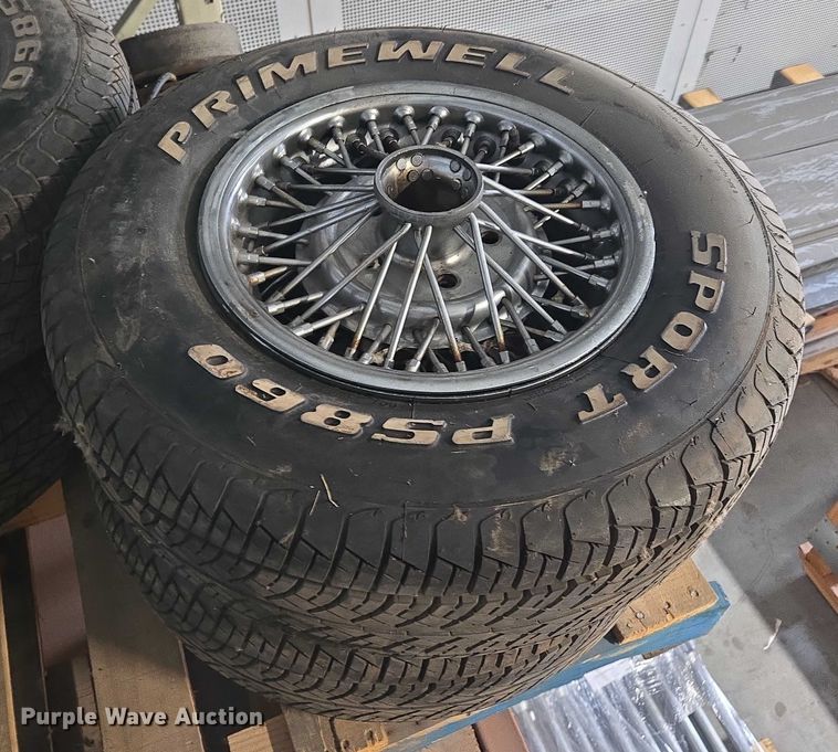image for item EM7493 (4) 215/70R14 tires and wheels