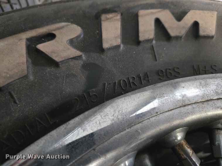 image for item EM7493 (4) 215/70R14 tires and wheels