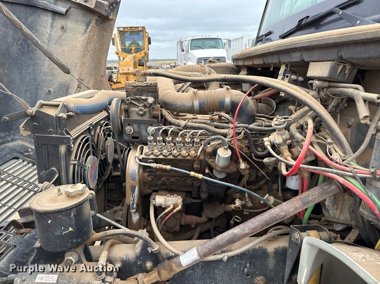 image for item EQ4900 1997 Freightliner FL70 feed mixer truck