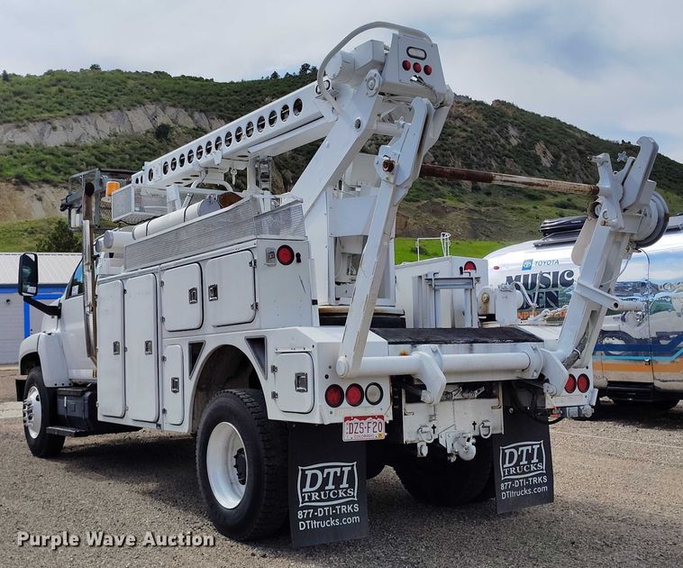 image for item DP4985 2009 GMC C8500 cable placer bucket truck