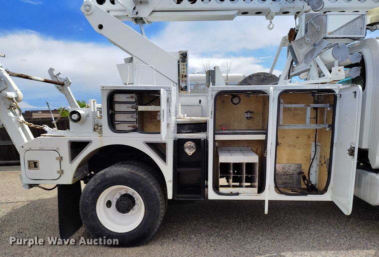image for item DP4985 2009 GMC C8500 cable placer bucket truck