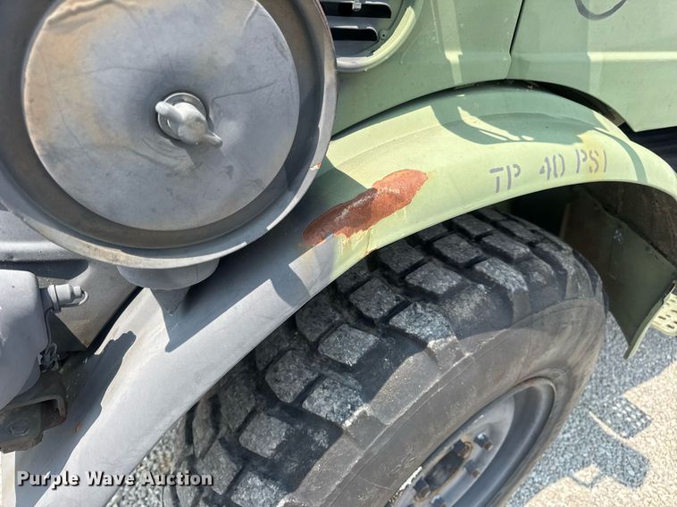 image for item DV4131 1987 Freightliner UC03JL Unimog emplacement excavator