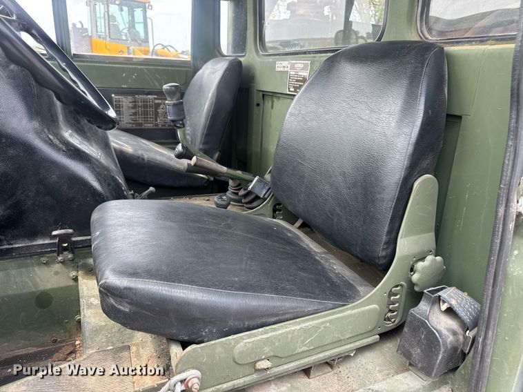 image for item DV4131 1987 Freightliner UC03JL Unimog emplacement excavator