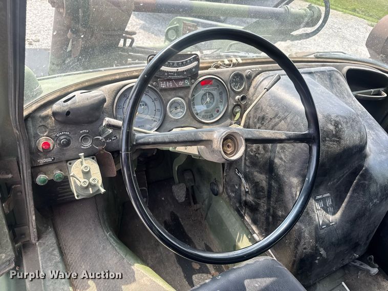 image for item DV4131 1987 Freightliner UC03JL Unimog emplacement excavator