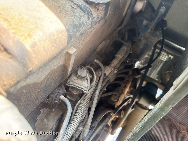 image for item DV4131 1987 Freightliner UC03JL Unimog emplacement excavator