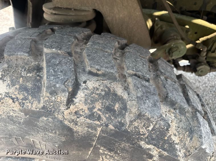 image for item DV4131 1987 Freightliner UC03JL Unimog emplacement excavator