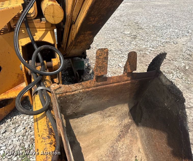 image for item DV4134 Case D100XR skid steer backhoe