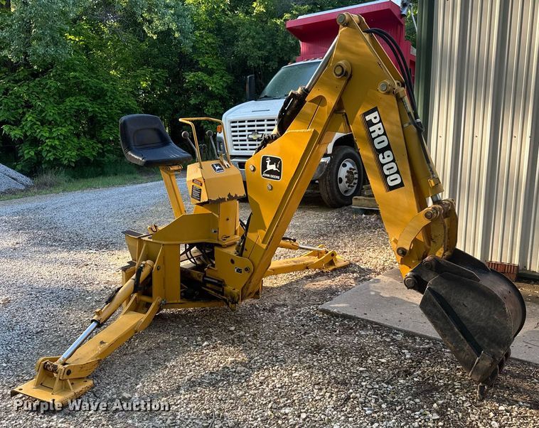 image for item DY0131 John Deere Pro 900 SSL skid steer backhoe