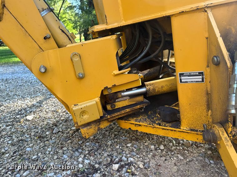 image for item DY0131 John Deere Pro 900 SSL skid steer backhoe