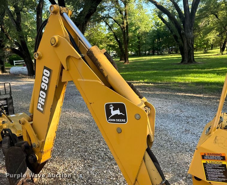 image for item DY0131 John Deere Pro 900 SSL skid steer backhoe