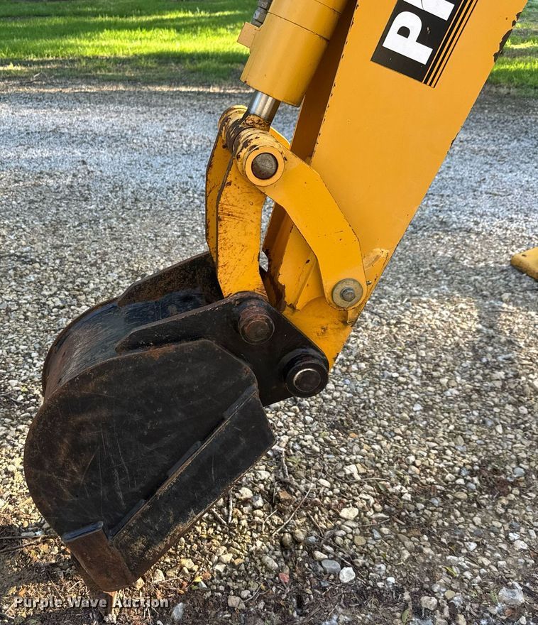 image for item DY0131 John Deere Pro 900 SSL skid steer backhoe