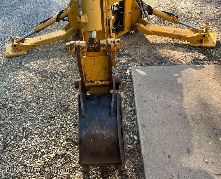 image for item DY0131 John Deere Pro 900 SSL skid steer backhoe