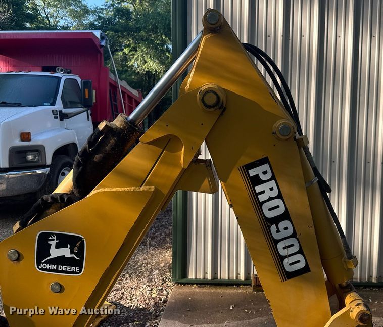 image for item DY0131 John Deere Pro 900 SSL skid steer backhoe