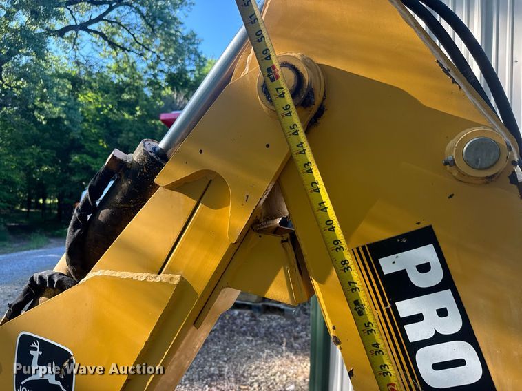 image for item DY0131 John Deere Pro 900 SSL skid steer backhoe