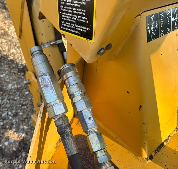 image for item DY0131 John Deere Pro 900 SSL skid steer backhoe