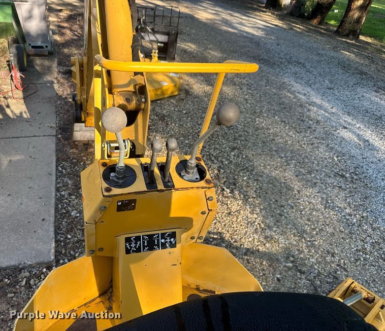 image for item DY0131 John Deere Pro 900 SSL skid steer backhoe