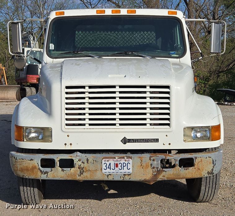 image for item EM7108 1995 International  4700 DT466 dump flatbed truck