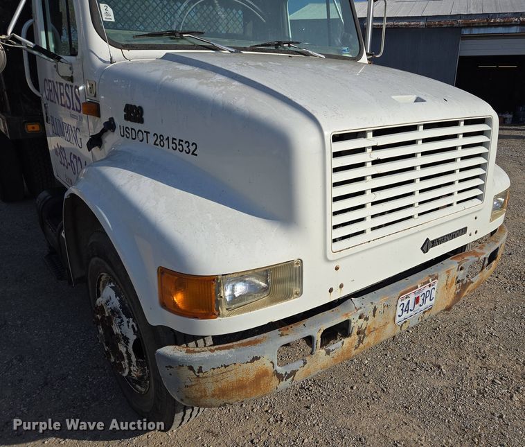 image for item EM7108 1995 International  4700 DT466 dump flatbed truck