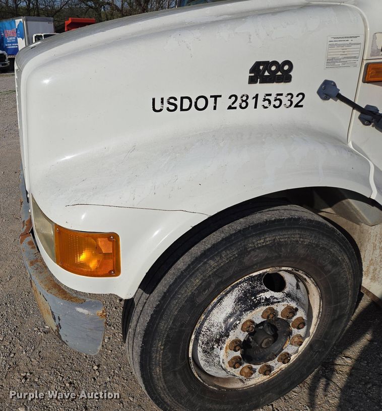 image for item EM7108 1995 International  4700 DT466 dump flatbed truck