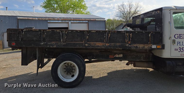 image for item EM7108 1995 International  4700 DT466 dump flatbed truck