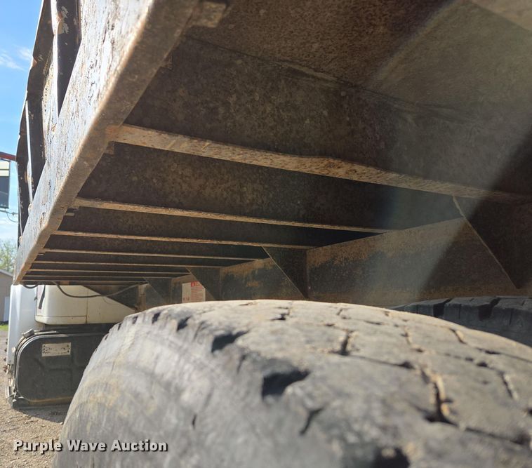 image for item EM7108 1995 International  4700 DT466 dump flatbed truck