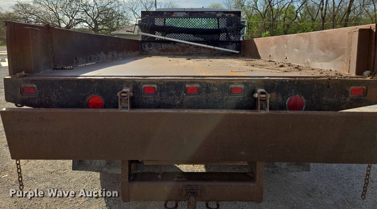 image for item EM7108 1995 International  4700 DT466 dump flatbed truck
