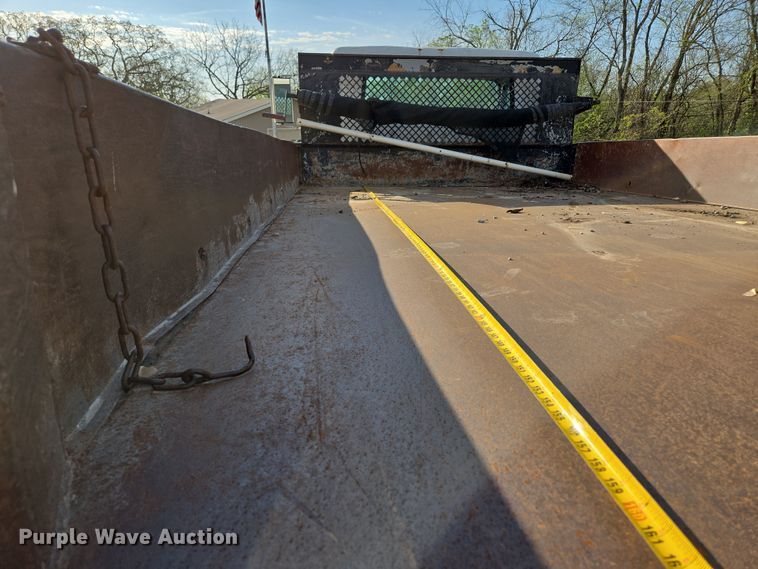 image for item EM7108 1995 International  4700 DT466 dump flatbed truck