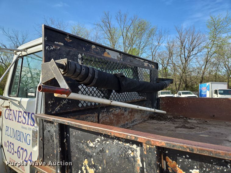 image for item EM7108 1995 International  4700 DT466 dump flatbed truck