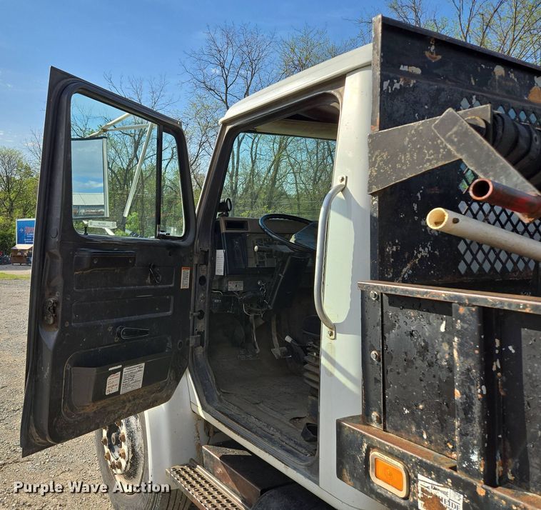 image for item EM7108 1995 International  4700 DT466 dump flatbed truck