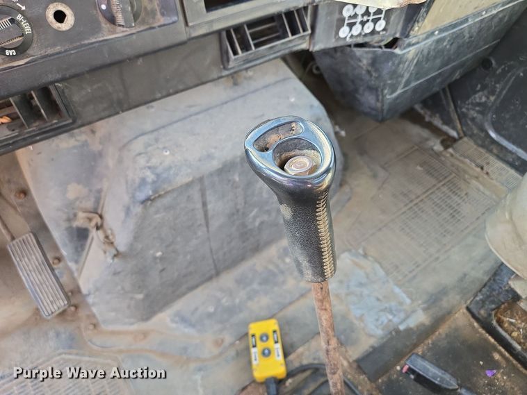 image for item EM7108 1995 International  4700 DT466 dump flatbed truck