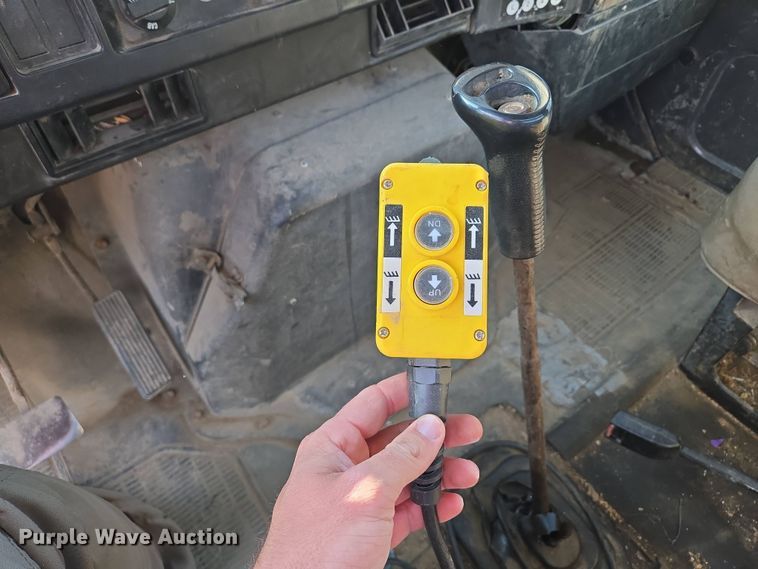 image for item EM7108 1995 International  4700 DT466 dump flatbed truck