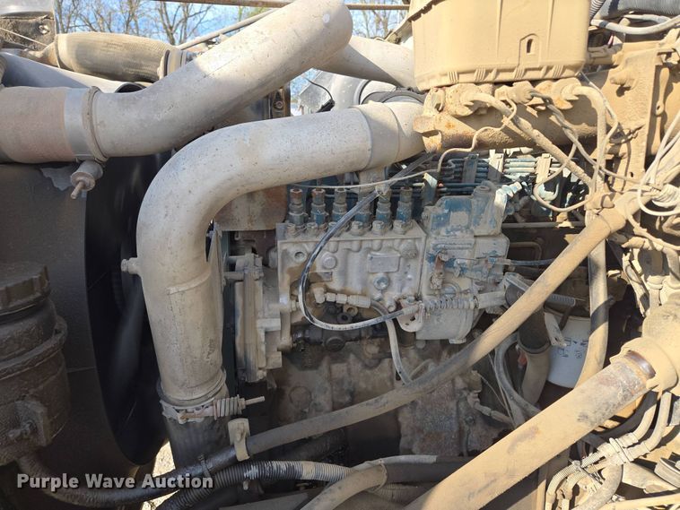 image for item EM7108 1995 International  4700 DT466 dump flatbed truck