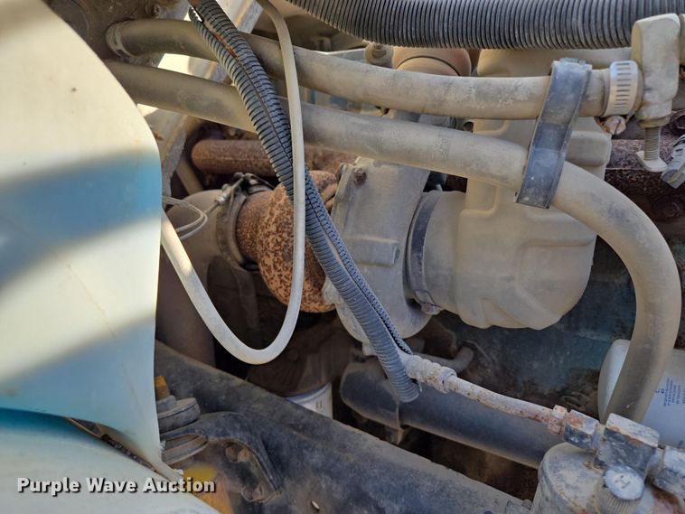 image for item EM7108 1995 International  4700 DT466 dump flatbed truck