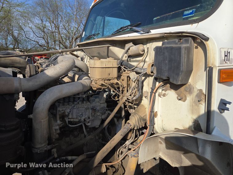 image for item EM7108 1995 International  4700 DT466 dump flatbed truck