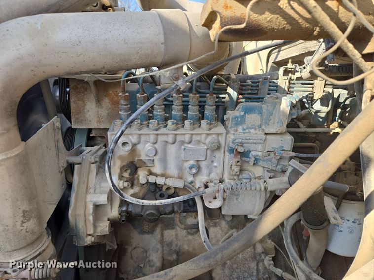 image for item EM7108 1995 International  4700 DT466 dump flatbed truck