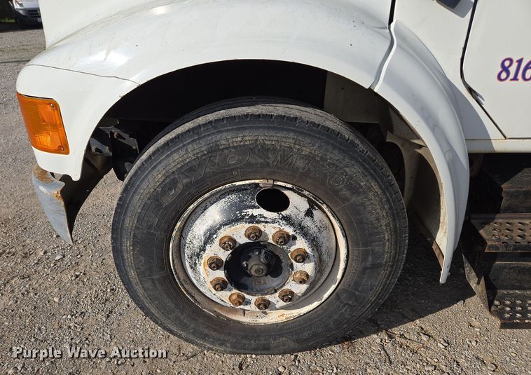 image for item EM7108 1995 International  4700 DT466 dump flatbed truck